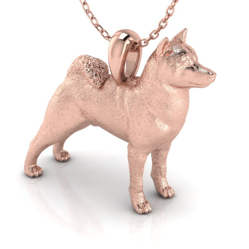 Silver dog pendant necklace with textured fur details on a chain, perfect accessory for dog lovers and jewellery enthusiasts worldwide, also available in solid gold. Made by Chris Simpson Designs in the United Kingdom.