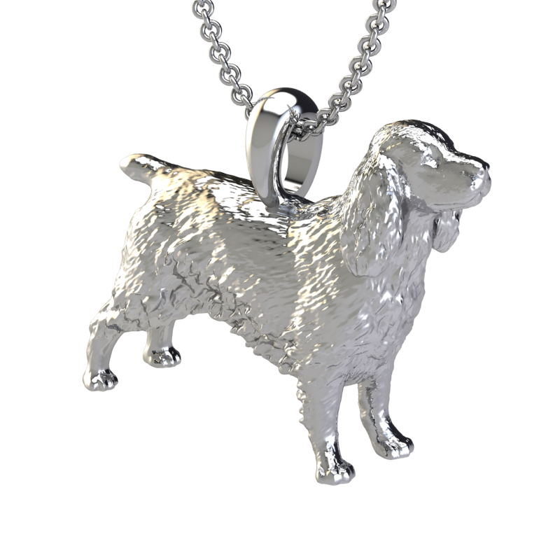 Silver dog pendant necklace with textured fur details on a chain, perfect accessory for dog lovers and jewellery enthusiasts worldwide, also available in solid gold. Made by Chris Simpson Designs in the United Kingdom.