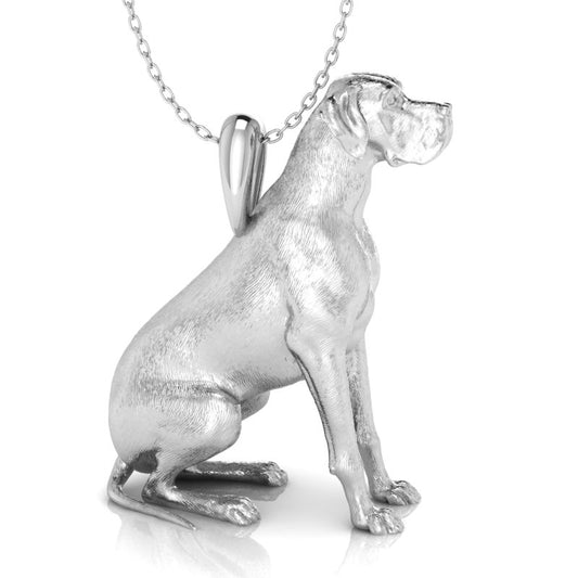 Silver dog pendant necklace with textured fur details on a chain, perfect accessory for dog lovers and jewellery enthusiasts worldwide, also available in solid gold. Made by Chris Simpson Designs in the United Kingdom.