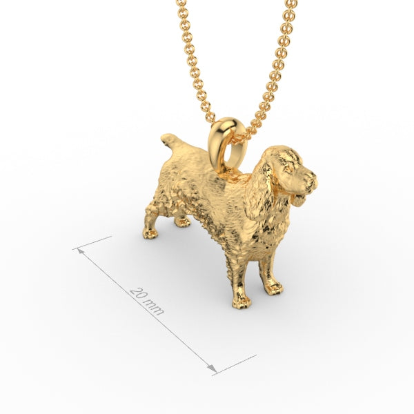 Silver dog pendant necklace with textured fur details on a chain, perfect accessory for dog lovers and jewellery enthusiasts worldwide, also available in solid gold. Made by Chris Simpson Designs in the United Kingdom.
