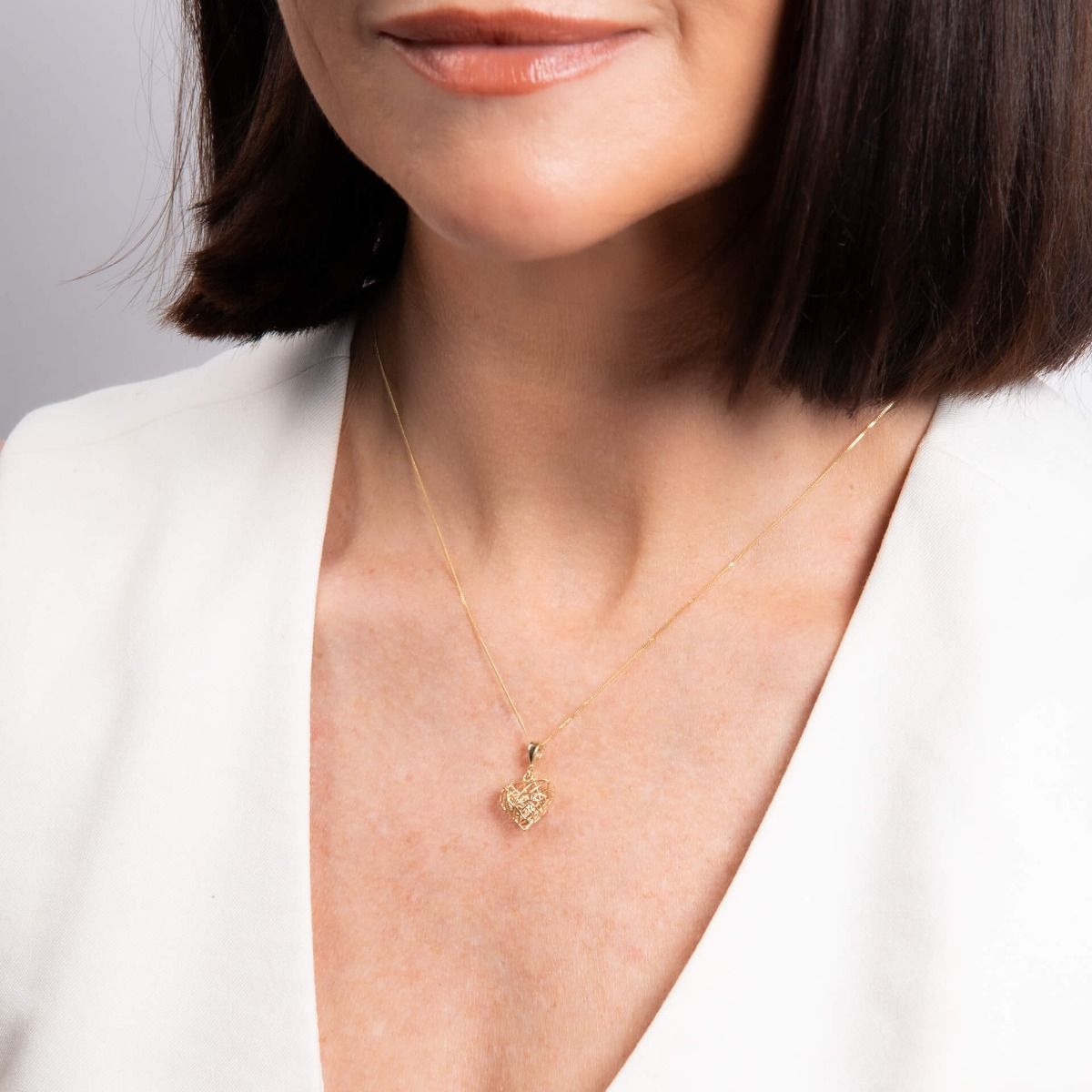 Caged Heart Pendant in 9ct Gold